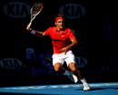 Roger Federer chases down a return