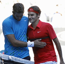 Juan Martin del Potro congratulates Roger Federer