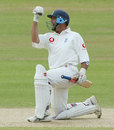 Nasser Hussain celebrates after bringing up his century with the winning runs in his final Test