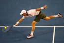 Tomas Berdych stretches to reach the ball in his quarter-final against Rafael Nadal