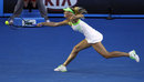 Maria Sharapova stretches for the ball