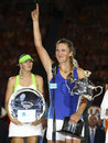 Victoria Azarenka revels in her victory as Maria Sharapova looks on