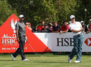 Tiger Woods watches Rory McIlroy tee off
