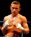 Carl Frampton poses after victory