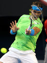 Rafael Nadal whips a forehand