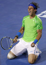 Rafael Nadal sinks to the ground in elation