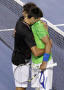 Rafael Nadal and Novak Djokovic embrace