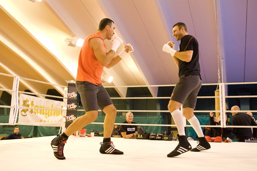 Vitali (R) and Wladimir Klitschko fool around during training
