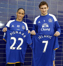 Steven Pienaar and Nikica Jelavic pose with their shirts 