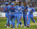 India get together after one of Praveen Kumar's strikes