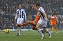 Danny Graham gets ahead of the WBA defence to score