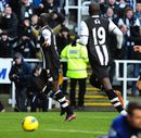 Papiss Cisse celebrates scoring the second goal of the game