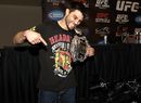 Carlos Condit poses for a photo after his victory over Nick Diaz 