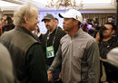 Tiger Woods chats to actor Bill Murray