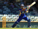Dinesh Chandimal carves through the off side