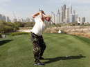 John Daly winds up from the tee during practice for the Dubai Desert Classic