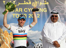 Mark Cavendish celebrates as Sheikh Khaled bin Ali al-Thani looks on