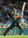 Michael Clarke cuts on his way to a half-century