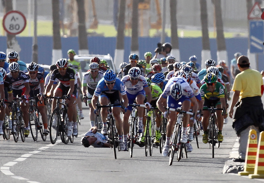 Mark Cavendish falls as the sprint gets underway