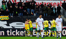 A shirtless Grant Holt delights the Norwich fans after scoring against Swansea