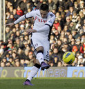 Fulham's Clint Dempsey lets a shot fly against Stoke
