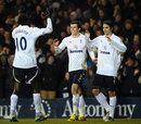 A delighted Niko Kranjcar is congratulated by his Tottenham team-mates after scoring