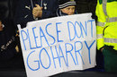 A young Spurs fan sends a message to manager Harry Redknapp