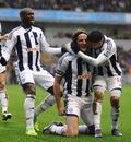 West Brom players celebrate their victory