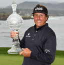Phil Mickelson hoists the trophy