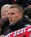 Lukas Podolski watches from the crowd