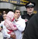 Carlos Tevez arrives at Manchester Airport