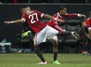 Robinho and Kevin-Prince Boateng do a jig of delight after the former's goal