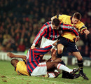 Arsenal and Crystal Palace players tussle