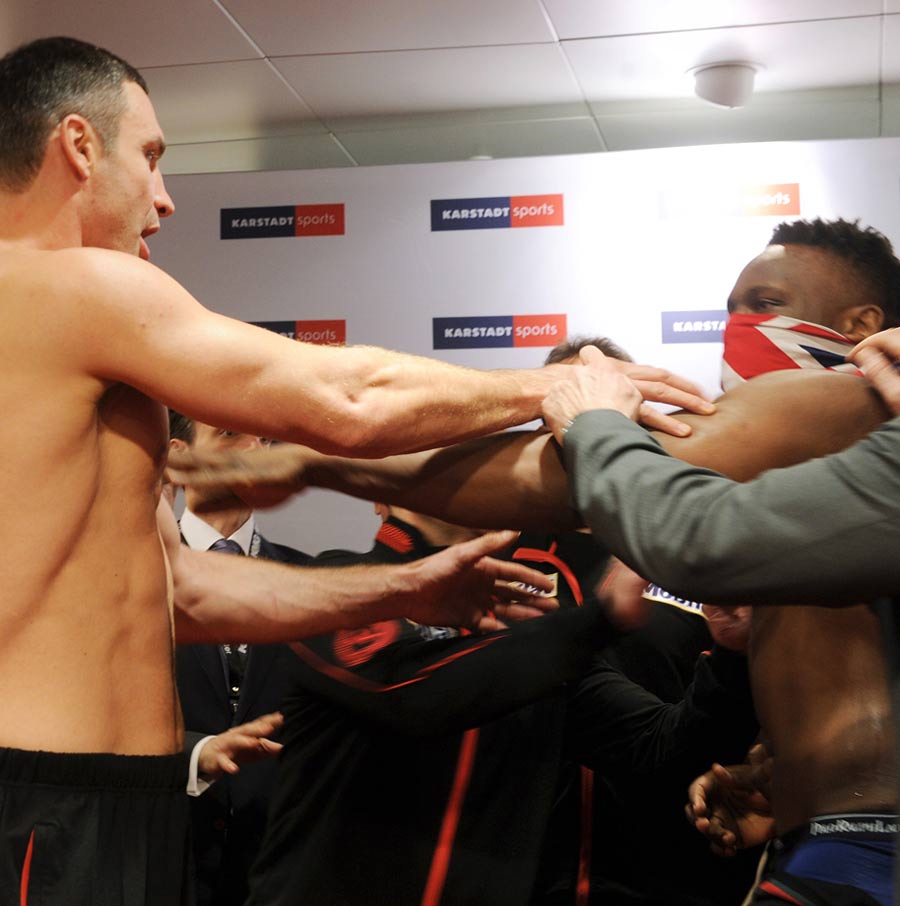 Dereck Chisora and Vitali Klitschko come to blows at the weigh-in