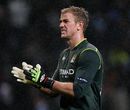 Joe Hart watches the action in the rain