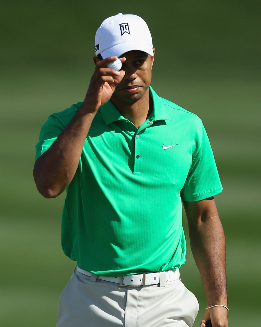 Tiger Woods acknowledges a big putt