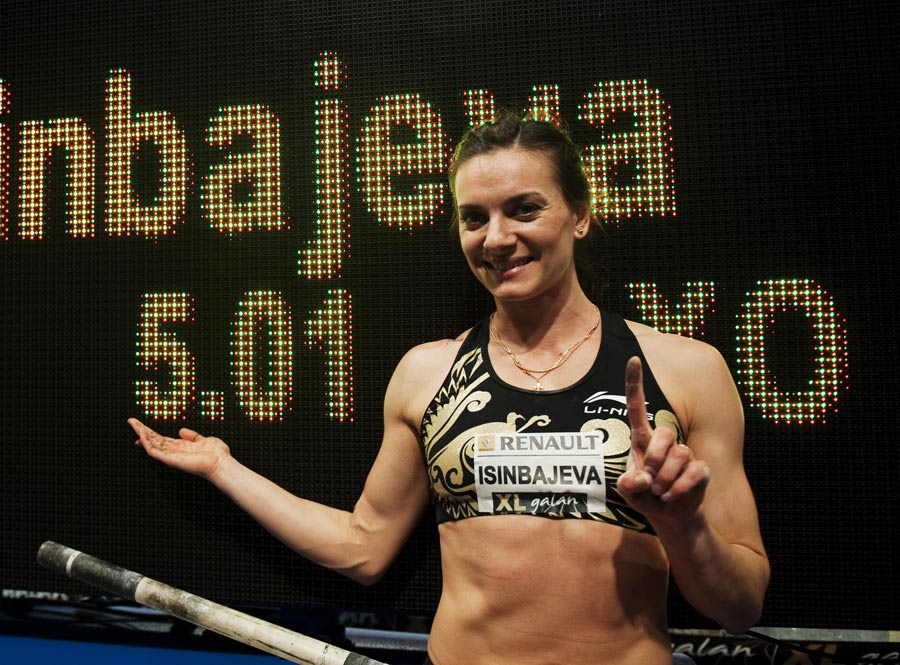 Yelena Isinbayeva poses next to her new indoor world record