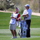 Lee Westwood shares a joke with his caddie Billy Foster