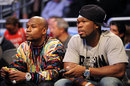 Floyd Mayweather and rapper 50 Cent watch the action