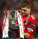 Steven Gerrard admires the Carling Cup