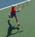 Andy Murray tracks down a forehand