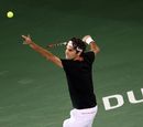 Roger Federer serves to Michael Llodra