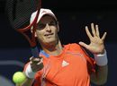 Andy Murray returns the ball to Marco Chiudinelli 