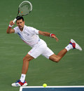Novak Djokovic rolls over a forehand