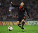 Arjen Robben fires his shot on goal