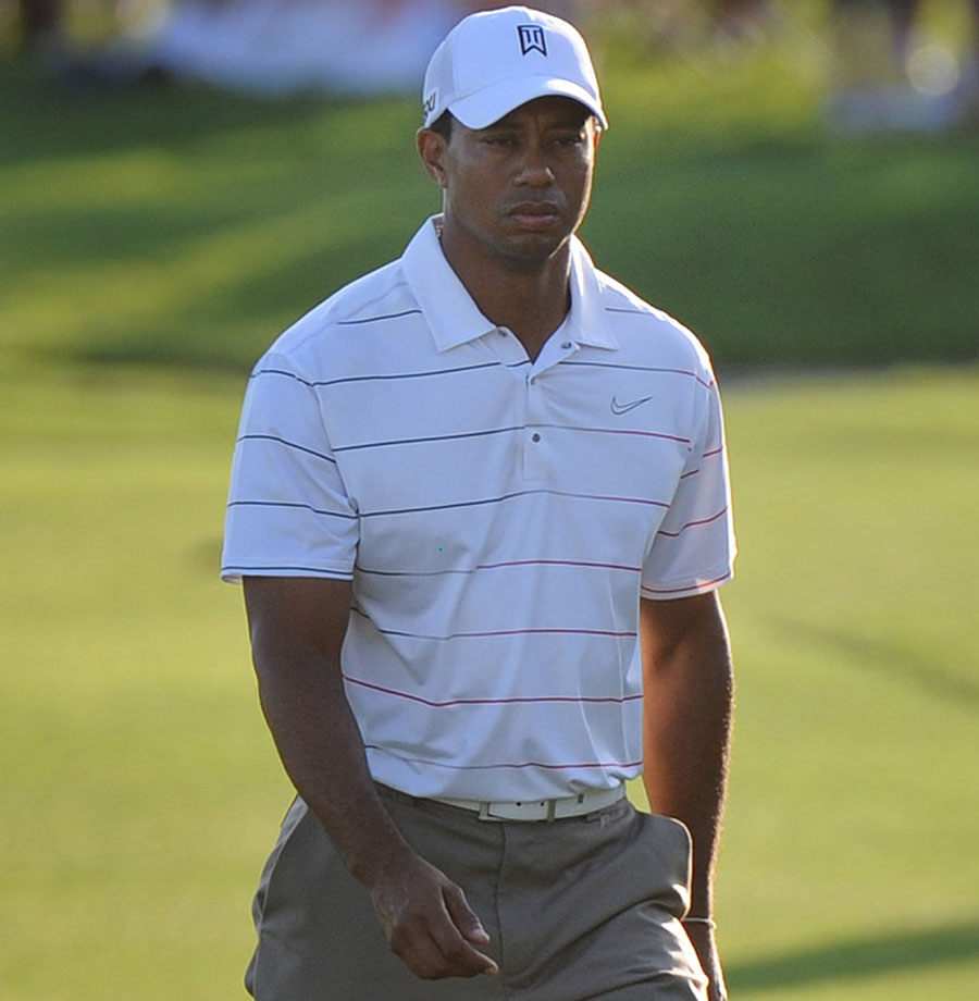 Tiger Woods cuts a dejected figure