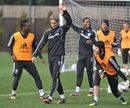 Fernando Torres celebrates during a training session