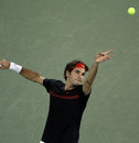 Roger Federer prepares to serve to Juan Martin Del Potro