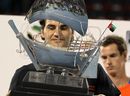 Roger Federer holds his trophy after beating Andy Murray