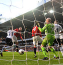 Wayne Rooney heads in United's opener